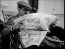 The Pleasure Garden (1925)Miles Mander and newspaper